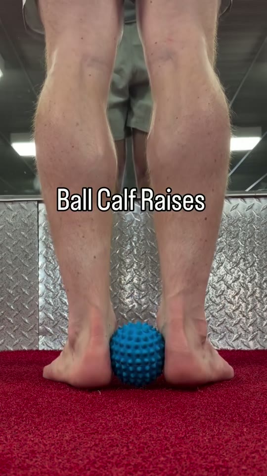 Calf raise with a ball: screenshot from the supplied demonstration at 0:15