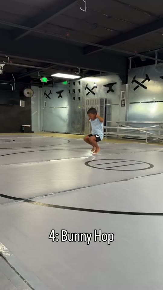 Bunny hop: deep-squat hops: screenshot from the supplied demonstration at 0:12